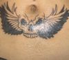 skull wing tattoos